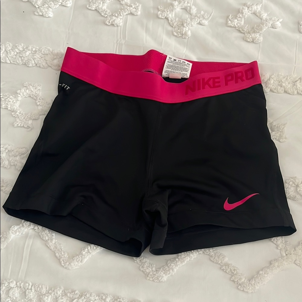 Women’s Black and Pink Nike Pro Shorts size medium